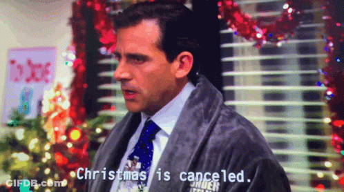 A Man In A Robe Says Christmas Is Canceled In Front Of A Christmas Tree GIF