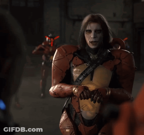 A Man In A Robotic Suit Has A Sticker On His Chest That Says ' X ' GIF