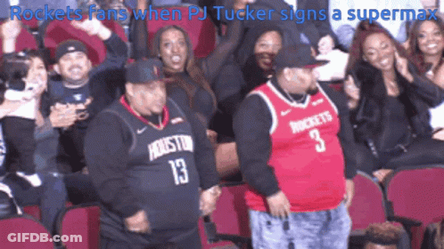 A Man In A Rockets Jersey Is Dancing In The Stands GIF