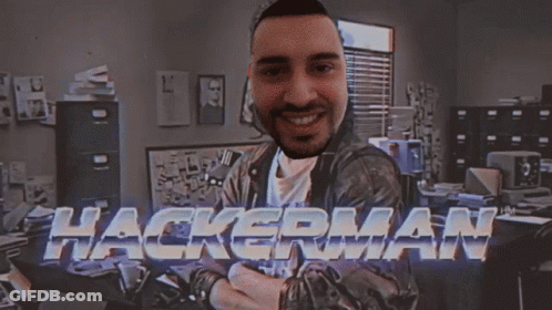 A Man In A Room With The Word Hackerman Behind Him GIF
