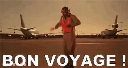 A Man In A Safety Vest Is Dancing On An Airport Runway With The Words Bon Voyage Written Below Him GIF