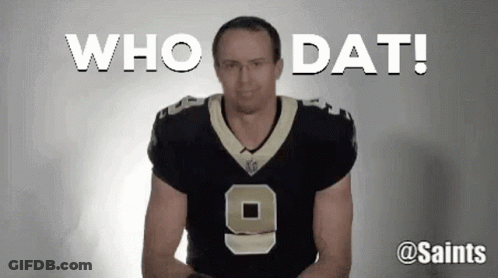A Man In A Saints Jersey Is Standing In Front Of A White Background And Says Who Dat ! GIF