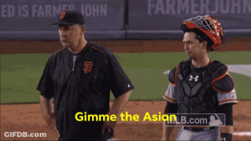 A Man In A San Francisco Giants Uniform Stands Next To A Catcher GIF