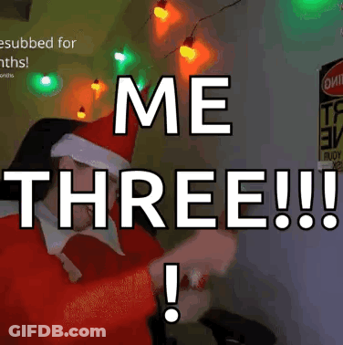 A Man In A Santa Hat Says Me Three !! GIF