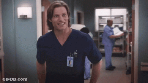 Man In Scrub Top With Dr. Name Tag GIF