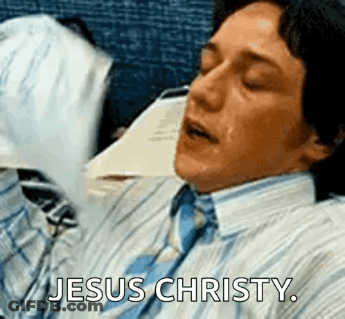 A Man In A Shirt And Tie Is Saying Jesus Christy While Sleeping GIF
