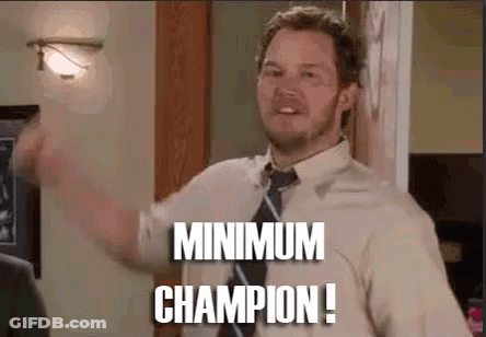 A Man In A Shirt And Tie Is Standing In A Room And Says `` Minimum Champion '' . GIF