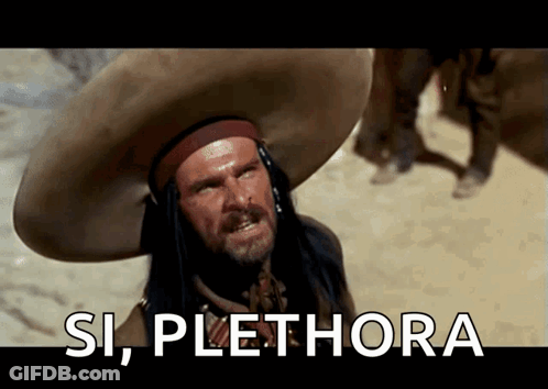 A Man In A Sombrero Says " Si Plethora " In The Desert GIF