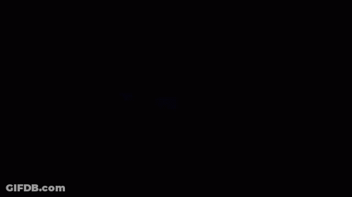 A Man In A Space Suit Is Sitting In Front Of A Screen That Says ' A ' On It GIF