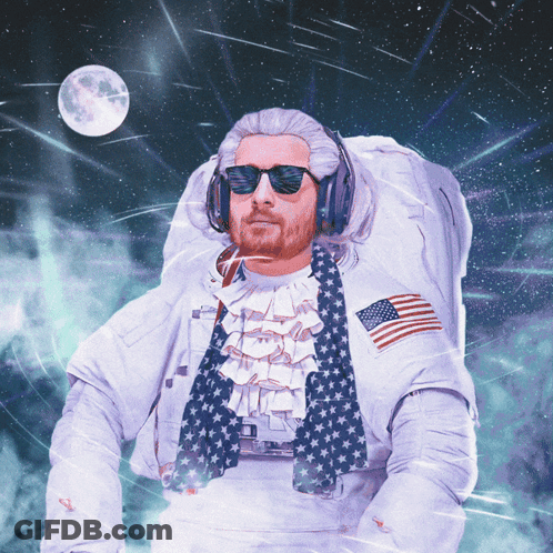 A Man In A Space Suit Is Wearing A Wig And Sunglasses GIF