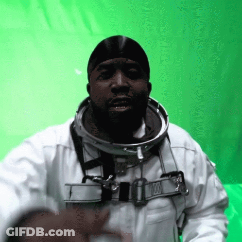 A Man In A Space Suit With A Collar That Says 000 GIF