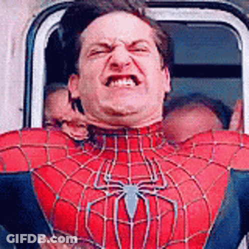 A Man In A Spider Man Costume Is Making A Funny Face . GIF
