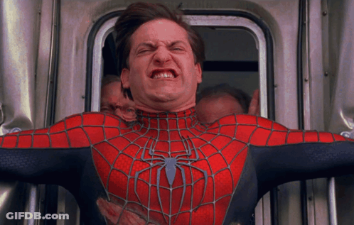 A Man In A Spider Man Costume Making A Funny Face GIF