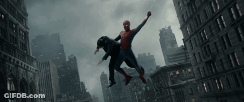 A Man In A Spiderman Costume Is Carrying Another Man GIF