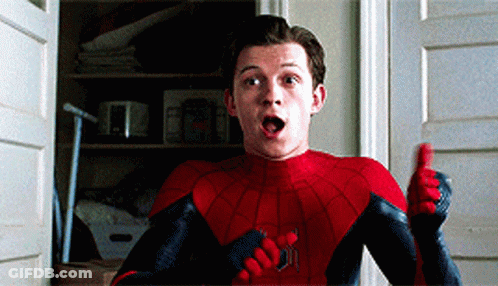 A Man In A Spiderman Costume Is Giving A Thumbs Up Sign GIF