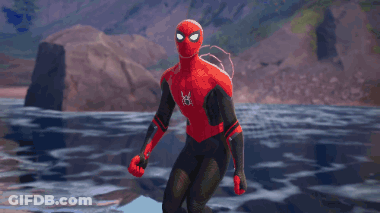 A Man In A Spiderman Costume Is Standing In The Water GIF