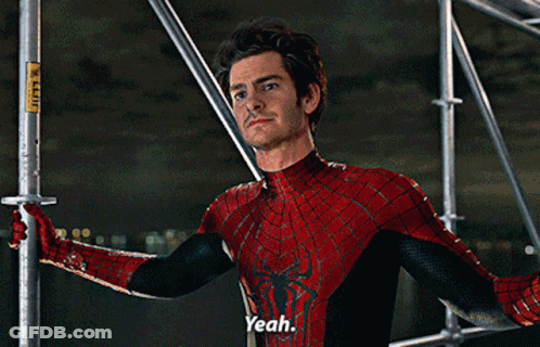 A Man In A Spiderman Costume Is Standing On A Scaffolding And Says Yeah GIF