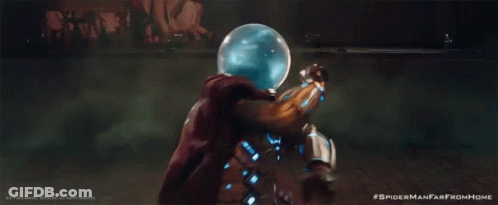 A Man In A Spiderman From Home Costume Is Holding A Green Object GIF