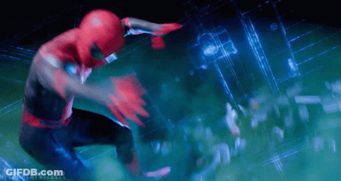 A Man In A Spiderman Suit Is Flying Through The Air GIF