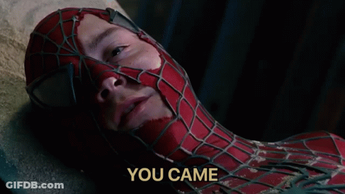A Man In A Spiderman Suit Is Laying On The Ground With The Words " You Came " Below Him GIF