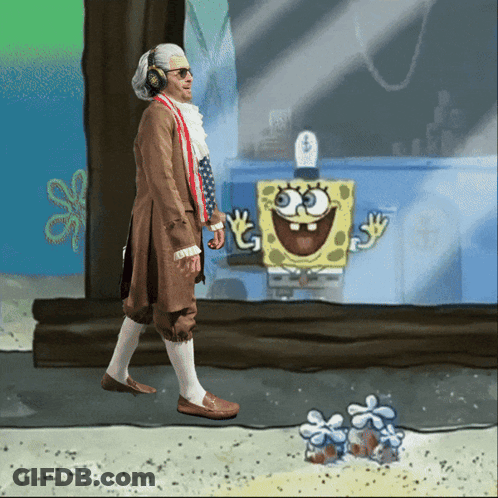 A Man In A Spongebob Costume Stands In Front Of A Spongebob Drawing GIF