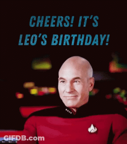 A Man In A Star Trek Uniform Is Holding A Drink And Says Cheers It 'S Leo 'S Birthday ! GIF