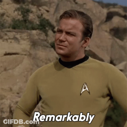 A Man In A Star Trek Uniform Is Making A Funny Face And Says Remarkably GIF