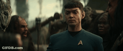 A Man In A Star Trek Uniform With An A On His Chest GIF