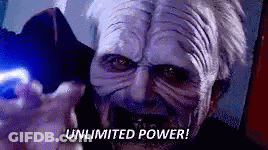 A Man In A Star Wars Mask Is Holding A Blue Light And Says `` Unlimited Power ! '' GIF