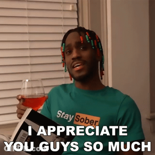 A Man In A Stay Sober Shirt Holds A Glass Of Wine GIF
