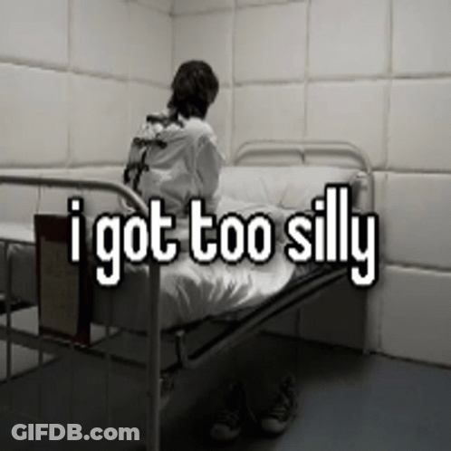 A Man In A Straight Jacket Is Sitting In A Hospital Bed With The Words " I Got Too Silly " Written Above Him GIF