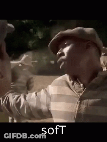 A Man In A Striped Shirt And Hat Is Talking To Another Man In A Striped Shirt And Hat . GIF