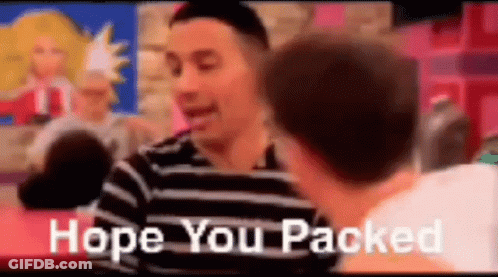 A Man In A Striped Shirt Is Talking To Another Man While Sitting At A Table . GIF