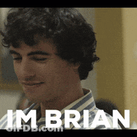 A Man In A Striped Shirt With The Name Brian On The Bottom Right GIF