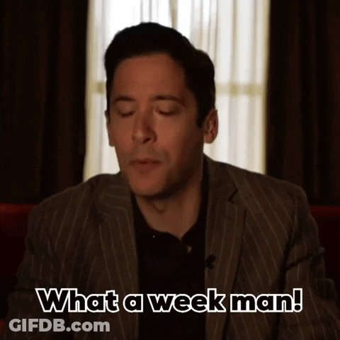 A Man In A Striped Suit Says What A Week Man GIF