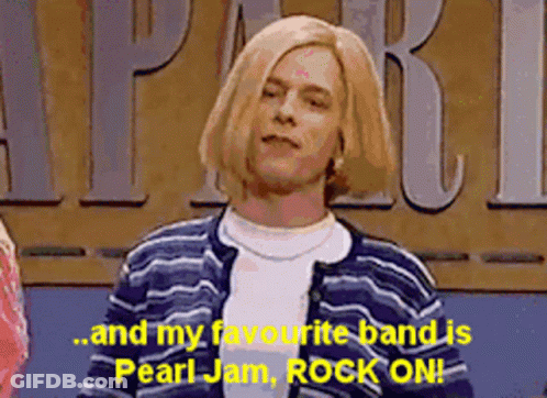 A Man In A Striped Sweater Is Talking About Pearl Jam GIF