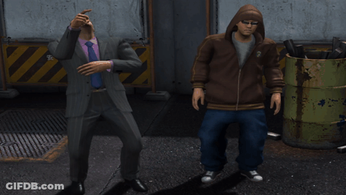 A Man In A Suit And A Man In A Hoodie Are Dancing GIF