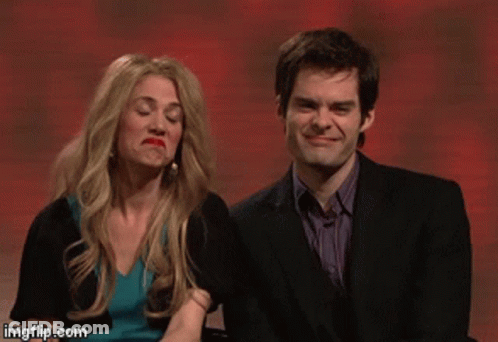A Man In A Suit And A Woman In A Blue Dress Are Sitting Next To Each Other With Imgflip.com At The Bottom GIF