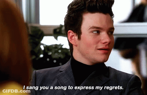 A Man In A Suit And Black Turtleneck Says I Sang You A Song To Express My Regrets GIF