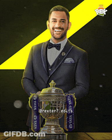 A Man In A Suit And Bow Tie Holds A Trophy With Ribbons That Say Tata GIF