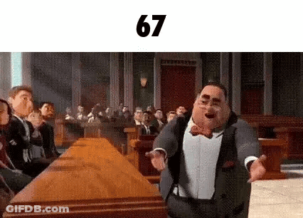 A Man In A Suit And Bow Tie Is Dancing In Front Of A Crowd Of People . GIF