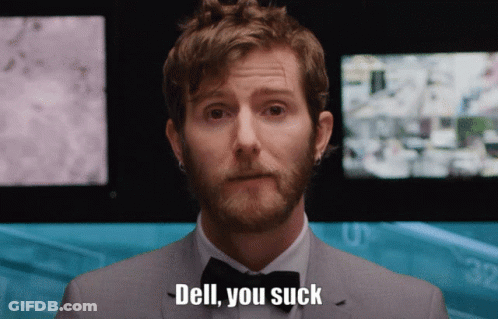A Man In A Suit And Bow Tie Is Saying " Dell You Suck " GIF