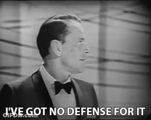 A Man In A Suit And Bow Tie Says I 'Ve Got No Defense For It . GIF