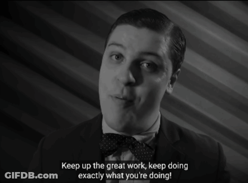 A Man In A Suit And Bow Tie Says Keep Up The Great Work Keep Doing Exactly What You Re Doing GIF