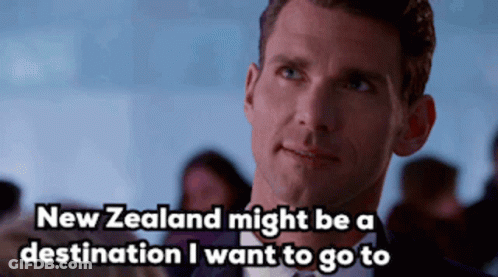 A Man In A Suit And Bow Tie Says New Zealand Might Be A Destination I Want To Go To GIF