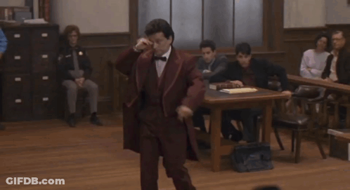 A Man In A Suit And Bow Tie Stands In Front Of A Group Of People With The Words " Everything That Guy Just Said " Below GIF