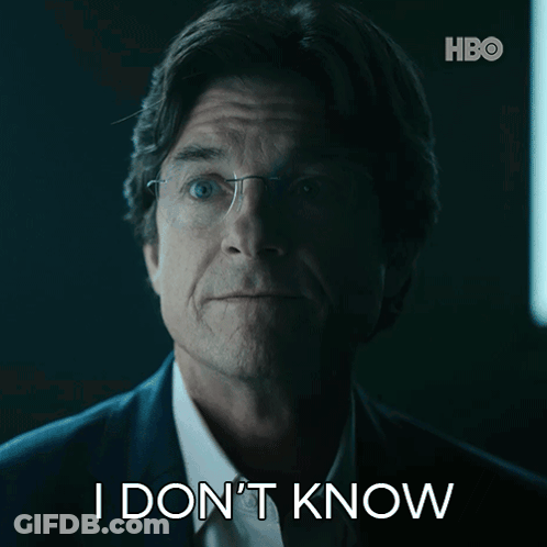 A Man In A Suit And Glasses Says I Don T Know GIF