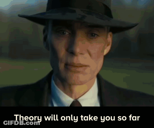 A Man In A Suit And Hat With The Words Theory Will Only Take You So Far Below Him GIF