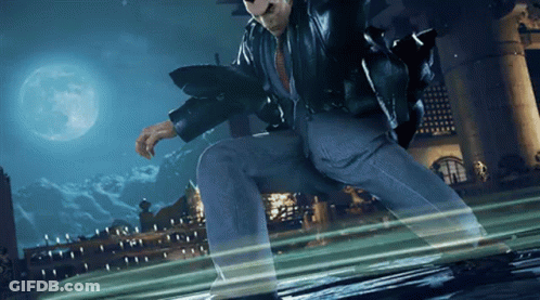 A Man In A Suit And Leather Jacket Is Jumping In The Air With A Full Moon In The Background GIF