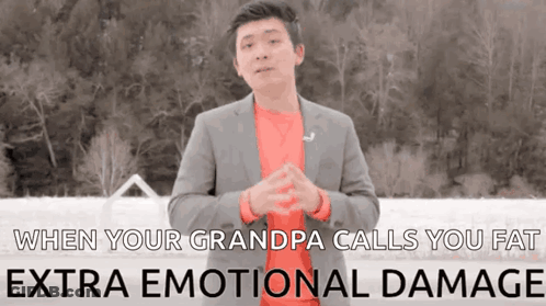 A Man In A Suit And Red Shirt Is Talking About When Your Grandpa Calls You Fat Extra Emotional Damage . GIF
